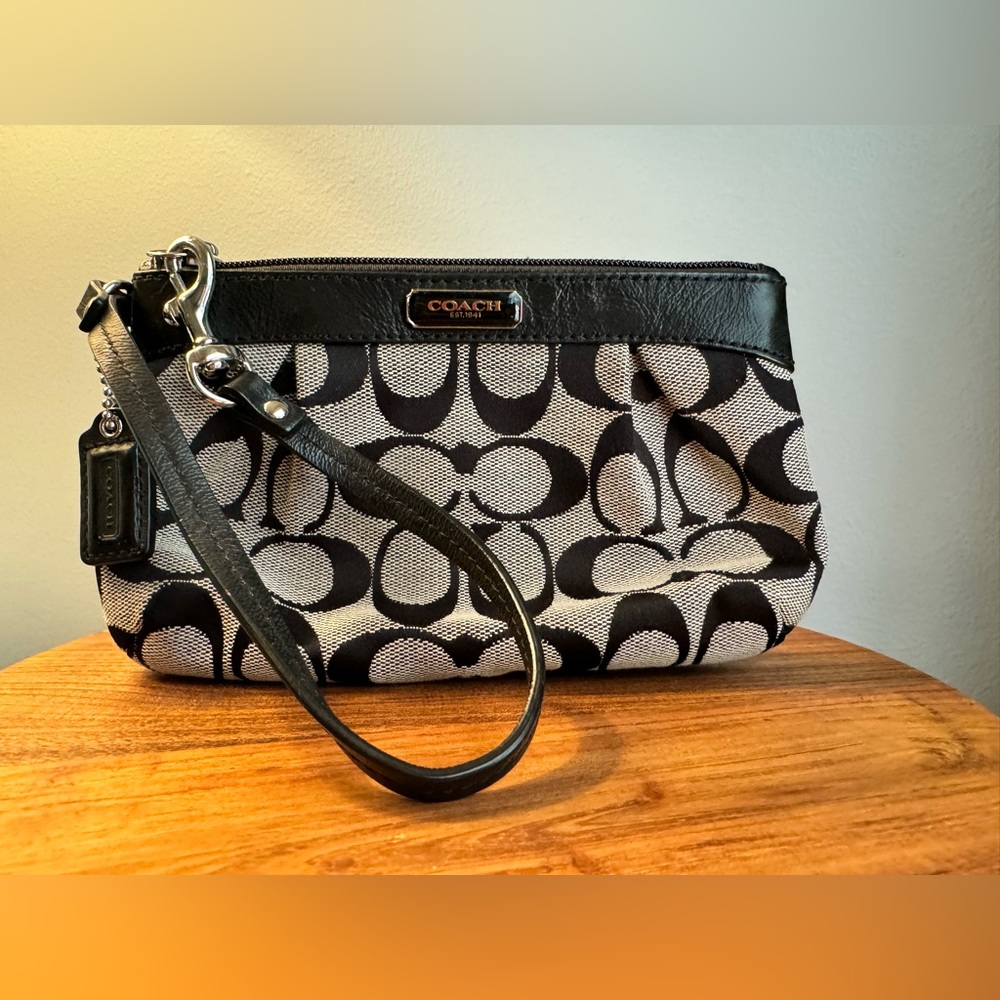 Coach wristlet in black signature canvas